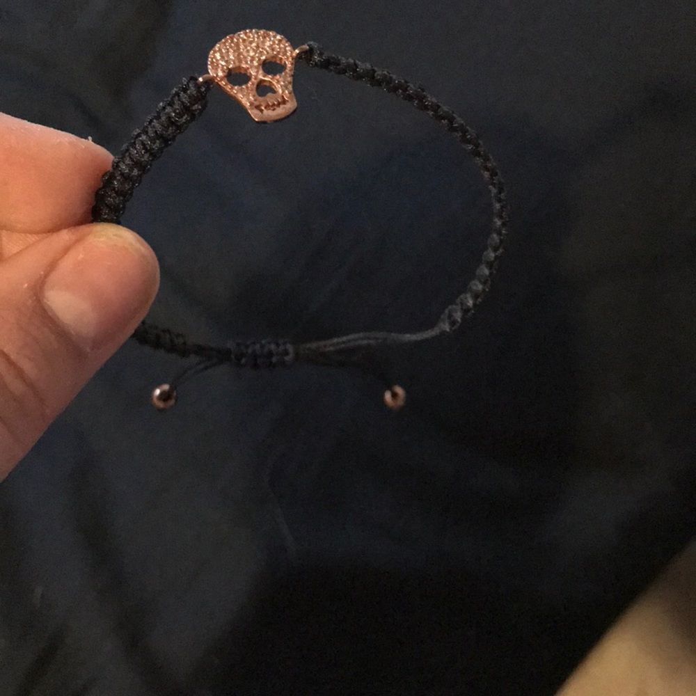 Super cute pull string black bracelet